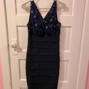 Woman’s navy blue dress